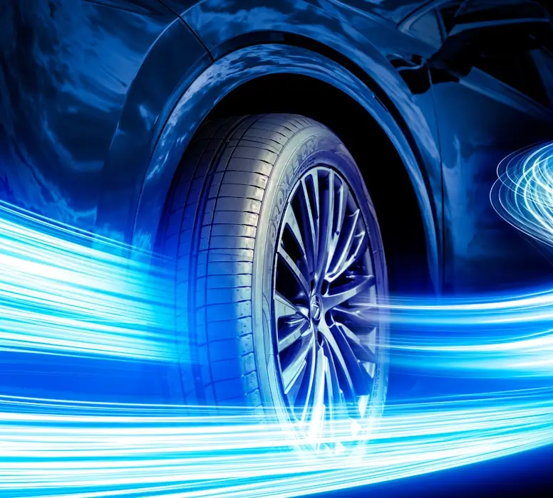 Close up of Proxes CR1 tyre with blue speed line effects flying by.